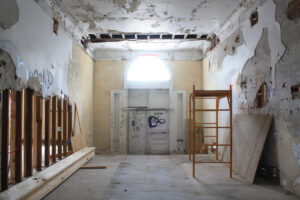 5a_Old-School-Apts_Historic-Entry-Hall_Before
